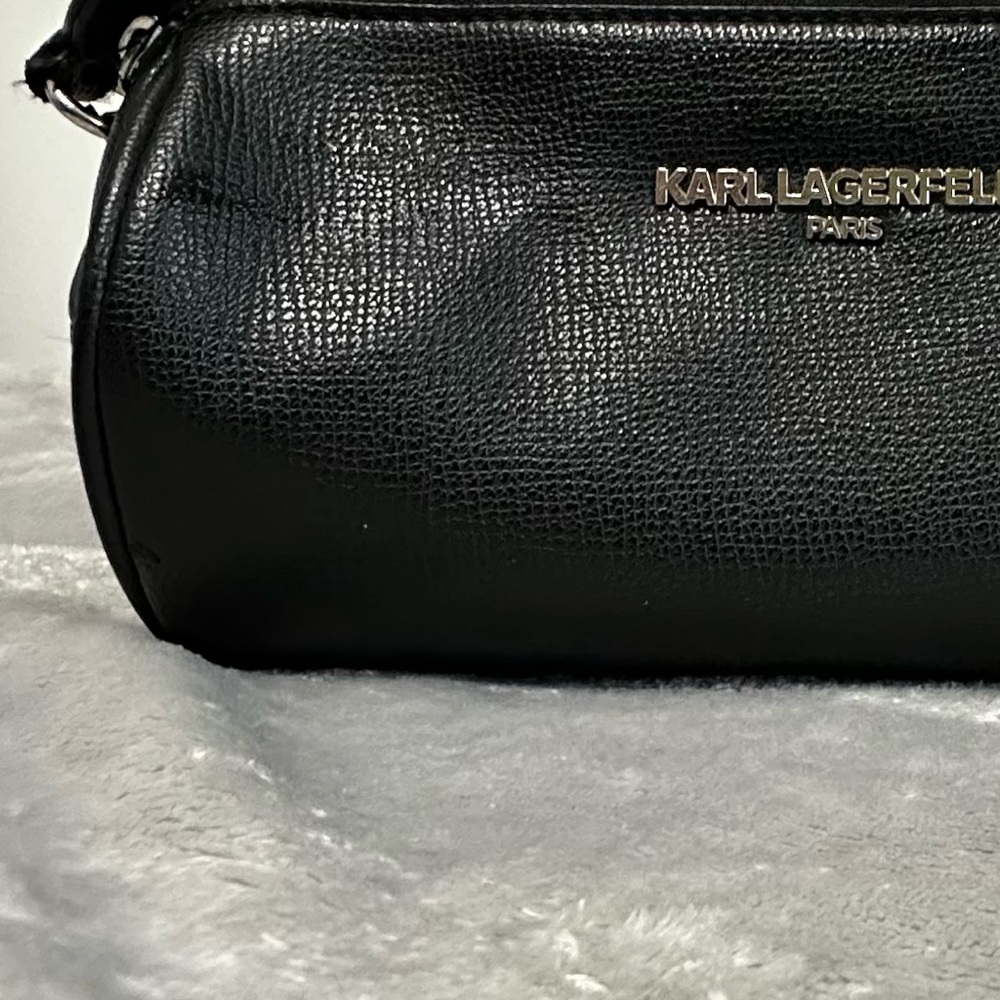 Karl Lagerfeld Paris Black Pebbled Barrel Crossbody Bag with Logo Guitar Strap - Picture 5 of 13
